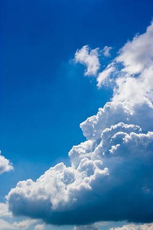 Clouds on a clear blue skyの写真素材