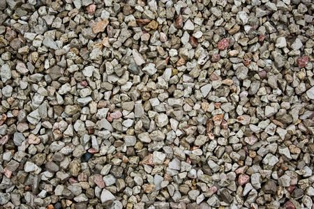 Background with pebbles from a shoreの写真素材