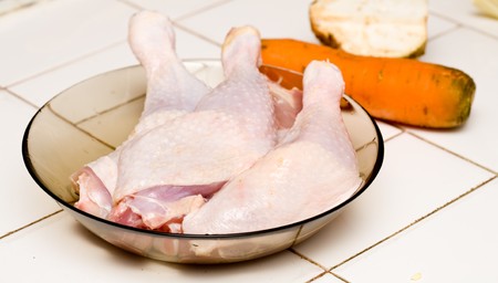 Close up of fresh raw chicken legsの写真素材