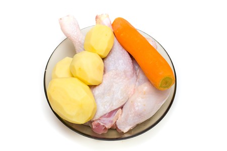 Close up of fresh raw chicken legsの写真素材