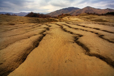 Dramatic landscape of muddy volcanoes at Berca, Romaniaの写真素材