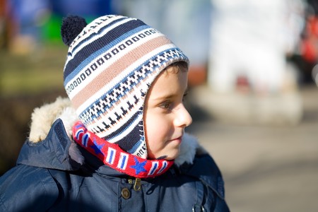 Portrait of a cute kid outdoorの写真素材