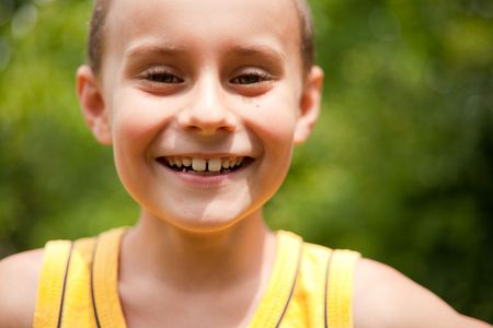 Cute kid having fun outdoorsの写真素材