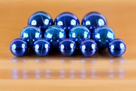 Blue Christmas decorations on golden shiny backgroundの写真素材