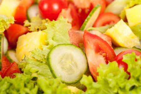 Close up of delicious fresh salad, excellent to be used as backgroundの写真素材