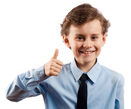 Cute kid making thumbs up sign, isolated on whiteの写真素材