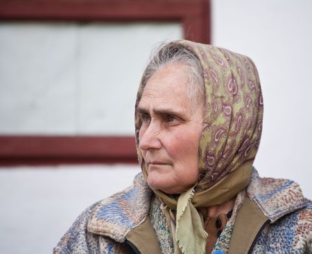 Closeup portrait of a sad old woman の写真素材