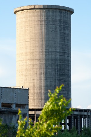 Industrial ruin or incomplete industrial building at sunsetの写真素材