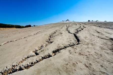 Landscape with cracked soil from Muddy Volcanoes, at Berca, Romania