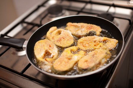 Delicious salmon fillets roasted in the frying panの写真素材