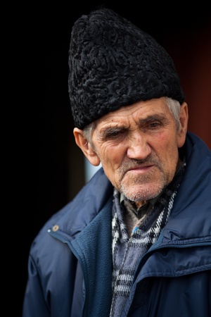 Portrait of an expressive senior farmer with hatの写真素材