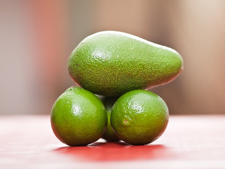Group of limes and avocado, studio shotの写真素材