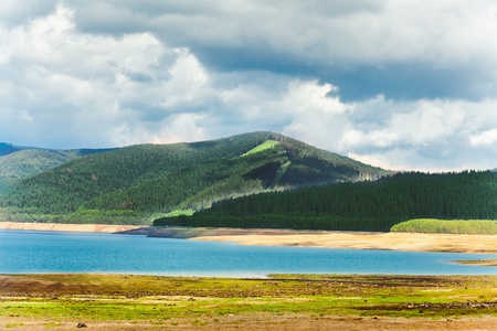 Landscape from Vidra Lake in Romanian Carpathians mountains in a summer dayの写真素材