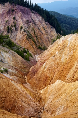 Erosional view of Ruginoasa Pit from Apuseni mountains, Romaniaの写真素材
