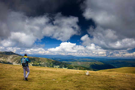Hiker alone in Romanian Carpathians, Parang mountains