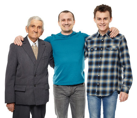 Male generations - grandfather, son and grandson in full length studio portrait