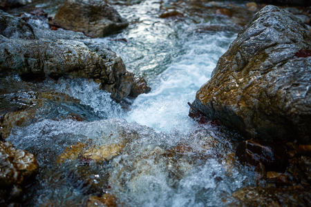 Landscape with a river in the mountains flowing rapidlyの写真素材