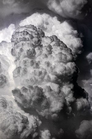 Cloudscape with very big cumulonimbus clouds shot with a long tele