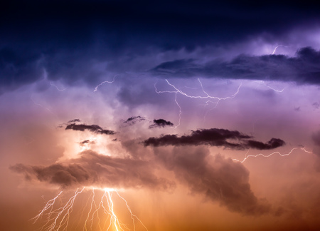 Cloudscape with lightning bolt hitting among the cloudsの写真素材
