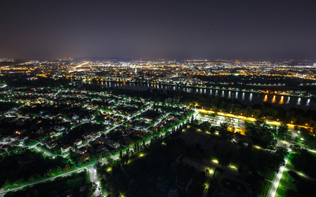 Vienna by night landscape with city lights, aerial viewの写真素材