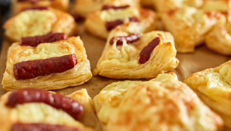 Pastry with small sausages and cheese, homemadeの写真素材