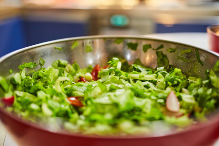 Closeup of a bowl with lettuce saladの写真素材