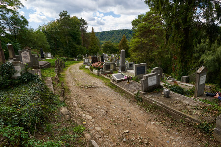Sighisoara, Romania - September 19th 2021: Images with the ancient cemetery in Sighisoara, some...