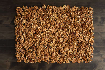 Studio shot of walnuts on a vintage wooden boardの写真素材