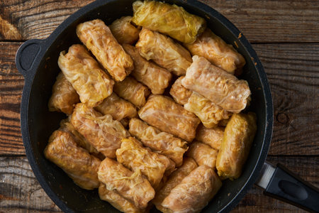 Cabbage rolls with pork meat and rice (sarmale), a traditional Romanian dish, in preparationの写真素材