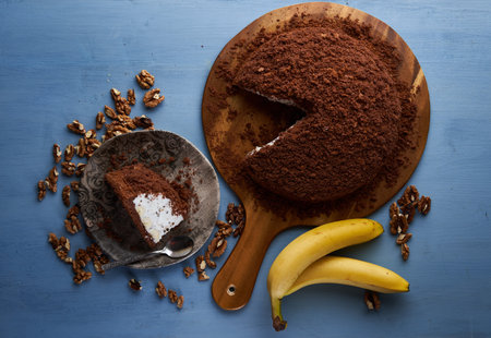 Mole hill dessert on wooden blue board background, flat lay shotの写真素材