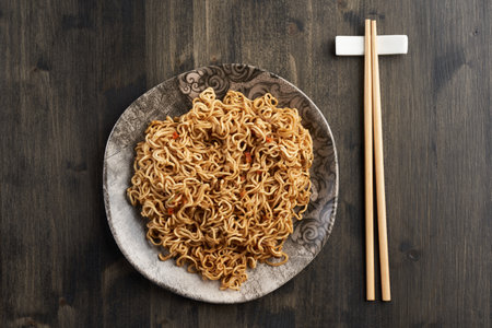 Japanese Soba cup noodles on a rustic wooden board