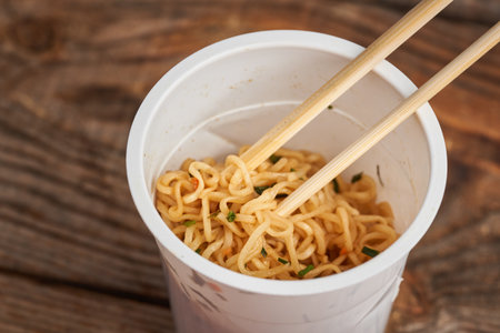 Chicken Pad Thai cup noodles, Korean speciality, cooked and ready to eatの写真素材