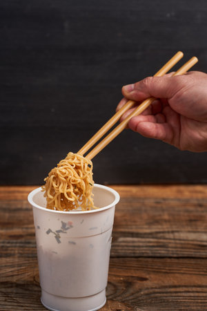 Chicken Pad Thai cup noodles, Korean speciality, cooked and ready to eatの写真素材