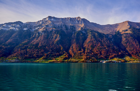 Azure lake in the Swiss Alps in the late autumn