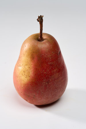 Closeup of a pear isolated on white background, studio shotの写真素材