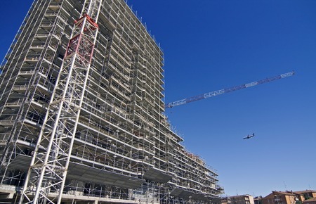 Scaffolding on a construction site of a new buildingの写真素材