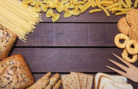 frame with bread, psata and carbohydrates - still lifeの写真素材