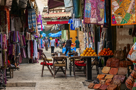 JERUSALEM, ISRAEL - june 15, 2019: Famous landmark of Jerusalem - Market in Old city, The Muslim Quarter. Narrow street with ancient Jerusalem architecture, Israel. Narrow street in old city.のeditorial素材