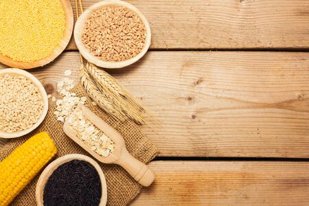 Cereals collection on wooden background - foodの写真素材