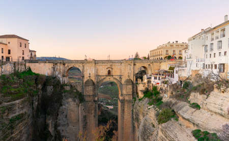 Panoramic view of the old city of Ronda, one of the famous white villages, at sunset in the province of Malaga, Andalusia, Spainの写真素材
