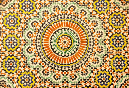 textures of ancient moroccan ceramic mosaic with geometric and floral pattern