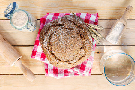 Starter sourdough (fermented mixture of water and flour to use as leaven for bread baking). The concept of a healthy dietの写真素材