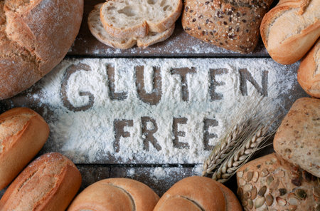 gluten free breads, glutenfree word written and bread rolls on gray backgroundの写真素材