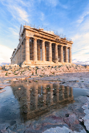 The ruins of an ancient Greek temple. Parthenon on the Acropolis in Athens, Greece on a sunsetの写真素材