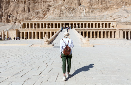 Woman traveler at Temple of Queen Hatshepsut, Valley of the Kings, Egyptの写真素材