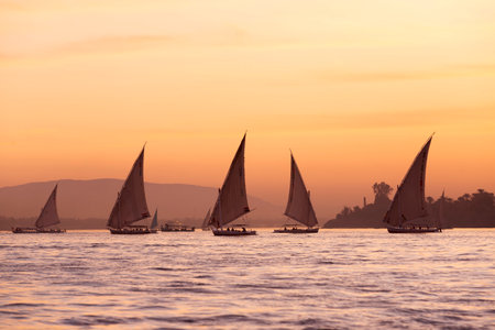 Tourists in a Felucca boat on the Nile River in Luxor Thebes - Egyptの写真素材