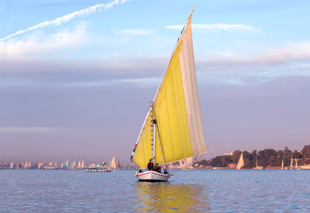 =Traditional Egyptian sailing boat (felucca) on the Nile river, Egyptの写真素材