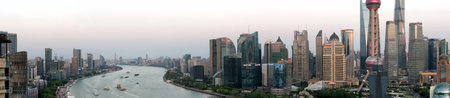 Shanghai, China: Aerial view of modern city skyline and buildings at sunrise in Shanghai.