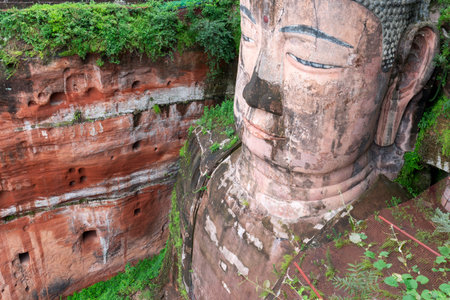 The Giant Leshan Buddha, in the southern part of Sichuan, China, near the city of Leshan, is the biggest and tallest stone Buddha statue in the worldの写真素材