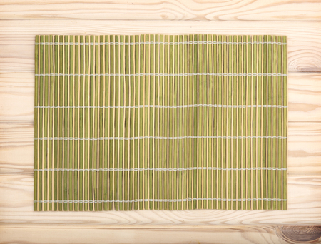bamboo napkin on wooden table. top viewの写真素材